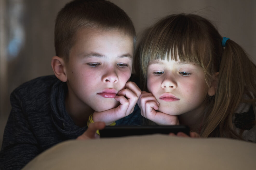two children brother and sister watching video on 2023 03 11 00 30 32 utc